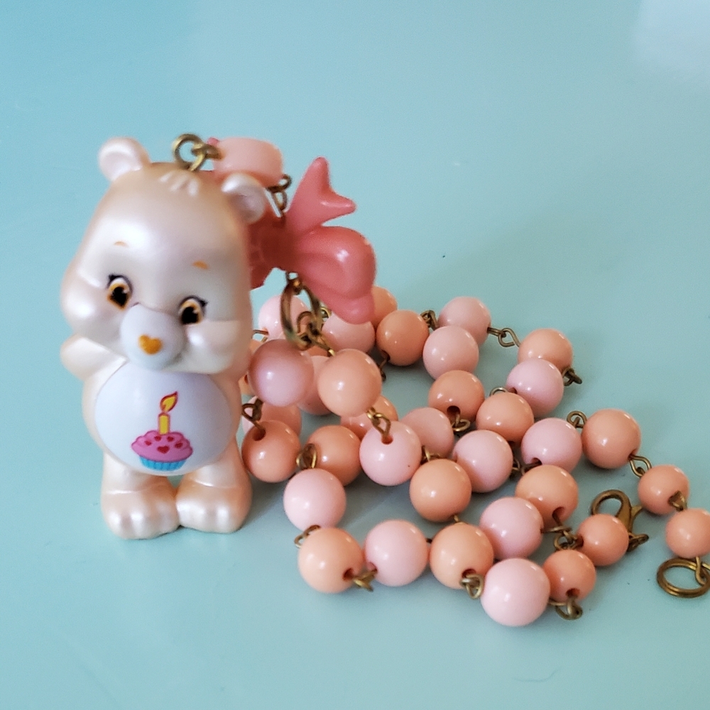 Stunning pink and peach pastel care bears charm necklace